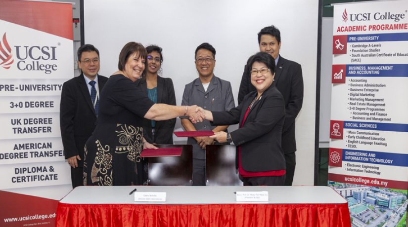 (Front row) Cathy Schultz, Director of SACE International programme shakes hand with Associate Professor Dr Mabel Tan, Chief Executive Officer, UCSI College after the MoA signing ceremony. (Front row) Cathy Schultz, Director of SACE International programme shakes hand with Associate Professor Dr Mabel Tan, Chief Executive Officer, UCSI College after the MoA signing ceremony.